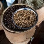 How do Japanese coffee shops master the art of precision with fewer grinders