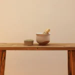 A steaming matcha bowl in a traditional Japanese cup with soft natural light.