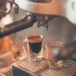 Coffee roaster machine displaying roast process in modern kitchen setting