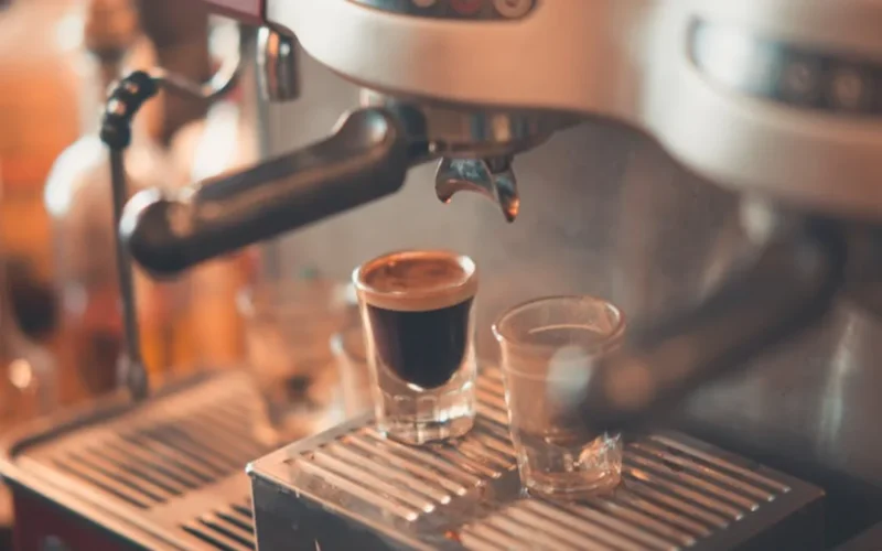 Coffee roaster machine displaying roast process in modern kitchen setting