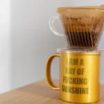 Close up of manual pour over coffee brewing with a Hario V60 dripper.