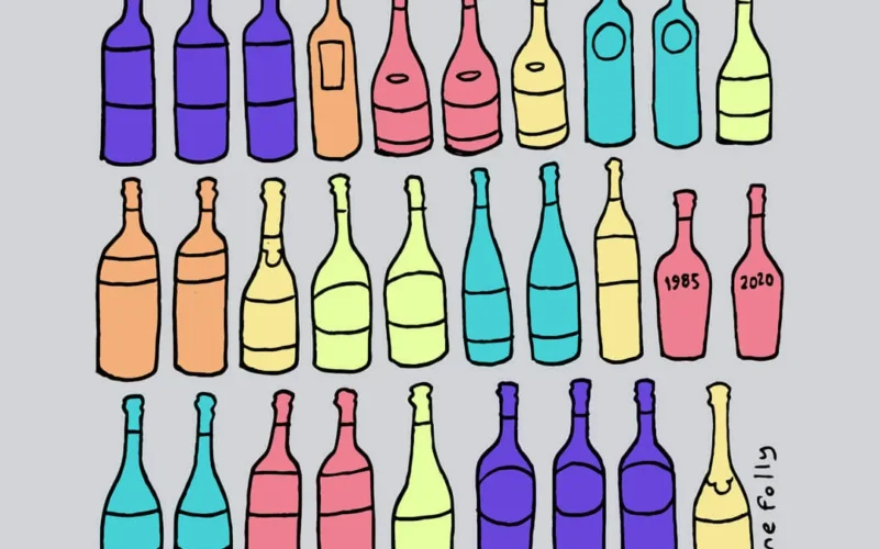 Neatly organized wine bottles stored horizontally on wooden racks in a professional cellar.