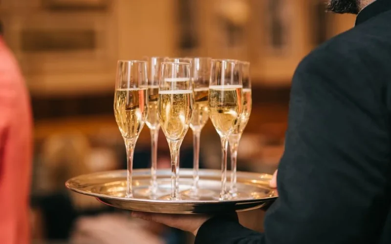 A bottle of Nyetimber Blanc de Blancs and a glass of English sparkling wine.
